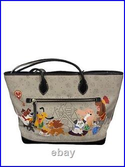Disney Parks Dooney & Bourke Reining Cats & Dogs PLuto Lady Dog Pattern Tote Bag
