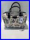 Disney_Parks_Haunted_Mansion_Purse_With_Shoulder_Strap_Black_Ivory_RETIRED_NWT_01_ayi